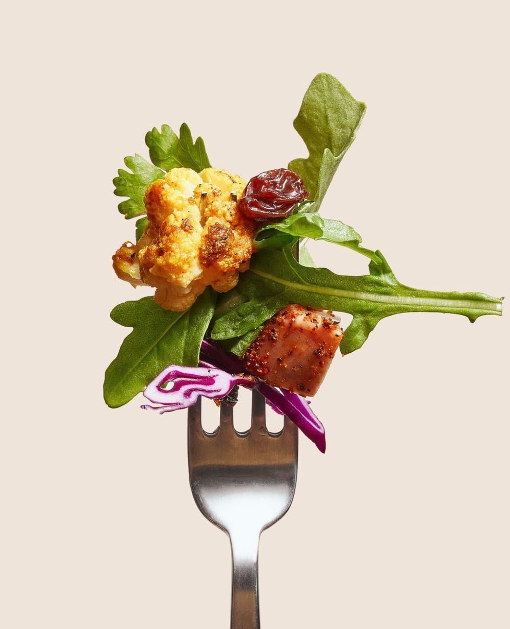 Fork with plated vegetables