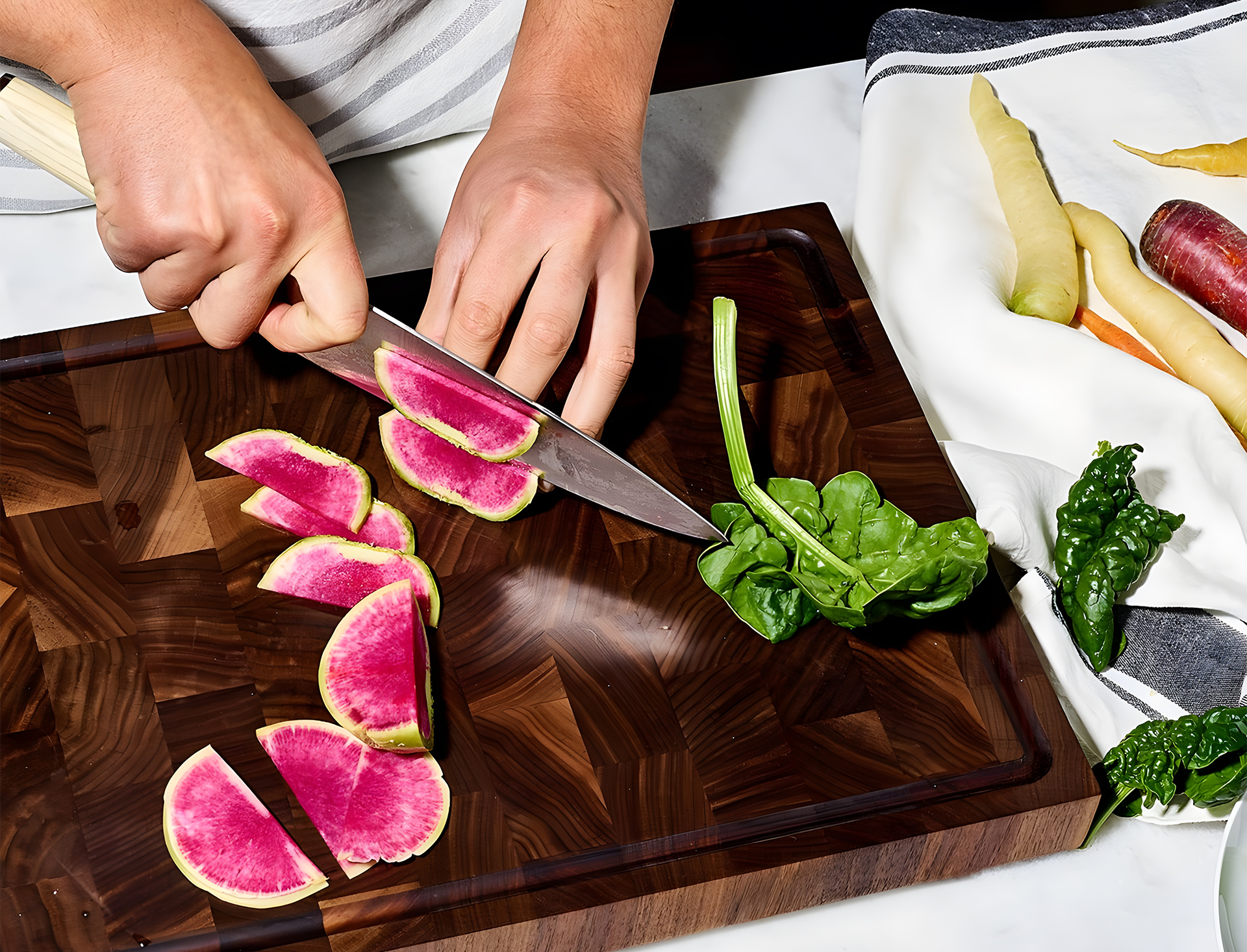 Chef preparing vegetables on a cutting board