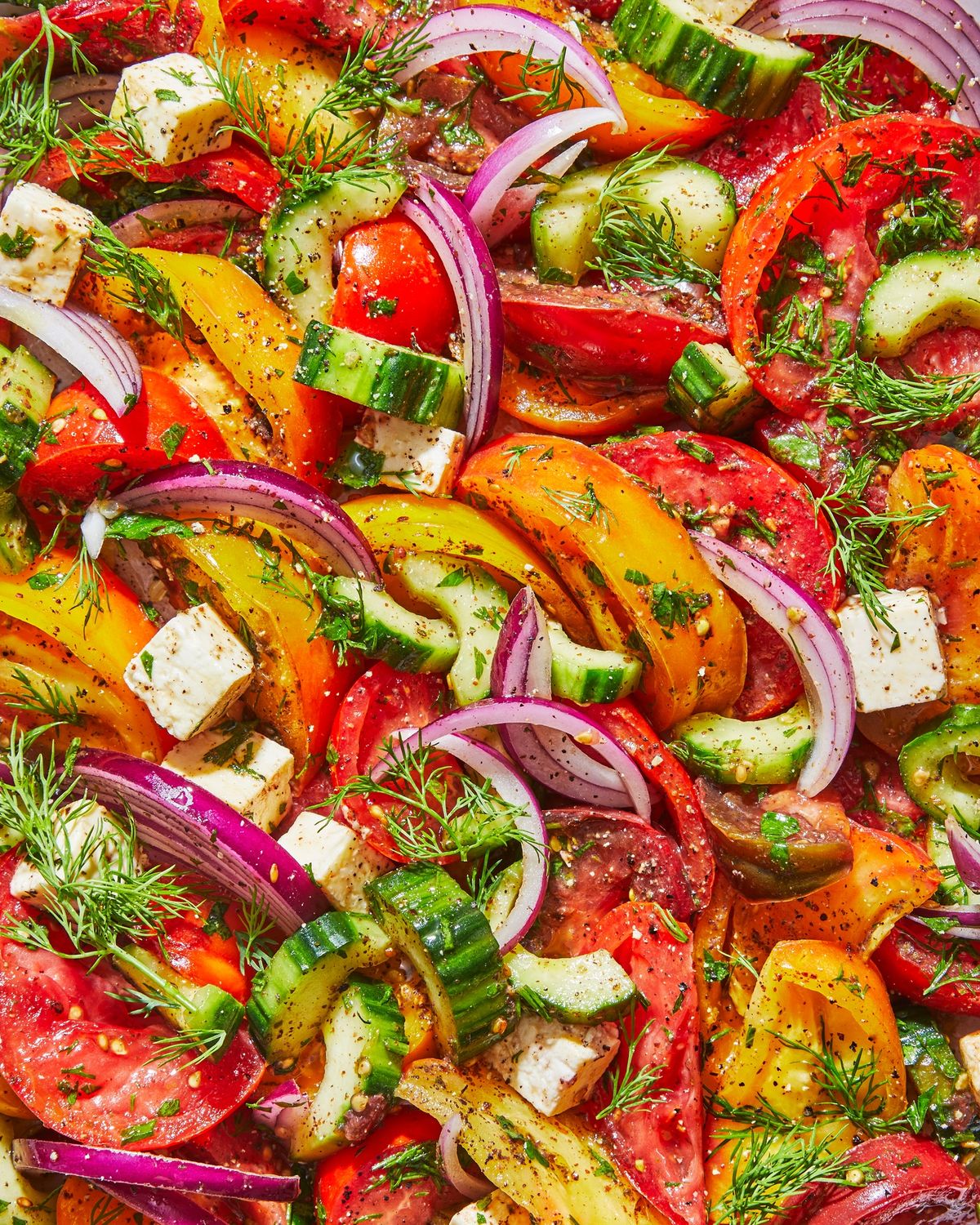 Colorful plant-forward dish with peppers, onions, and herbs
