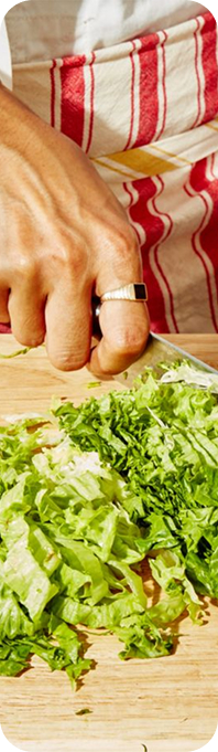 Chef chopping greens